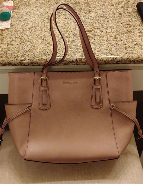 michael kors purse with bow|Michael Kors purse color chart.